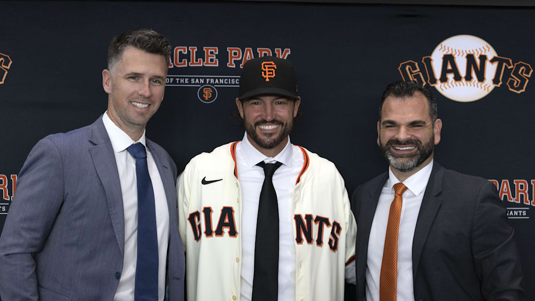 Tony Vitello (center) is introduced as the new manager of the San Francisco Giants by president of baseball operations Buster Posey (left) and general manager Zack Minasian at Oracle Park. 