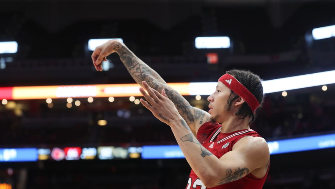 Louisville   s Tre White makes the basket against Georgia Tech Saturday night in the KFC Yum Center.
Feb. 10, 2024