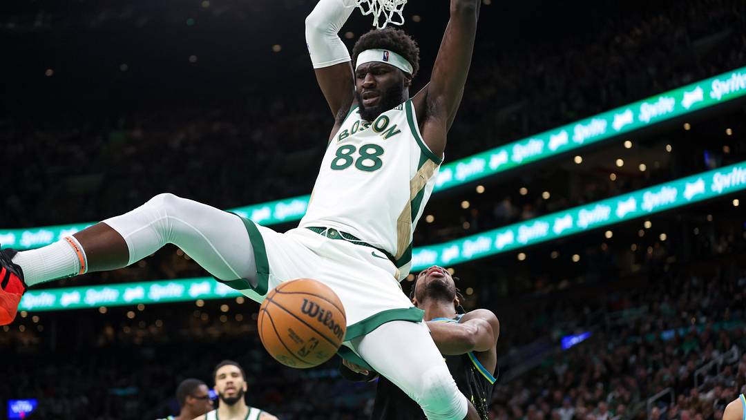 Jan 30, 2024; Boston, Massachusetts, USA; Boston Celtics center Neemias Queta (88) dunks the ball during the second half against the Indiana Pacers at TD Garden. Mandatory Credit: Paul Rutherford-Imagn Images