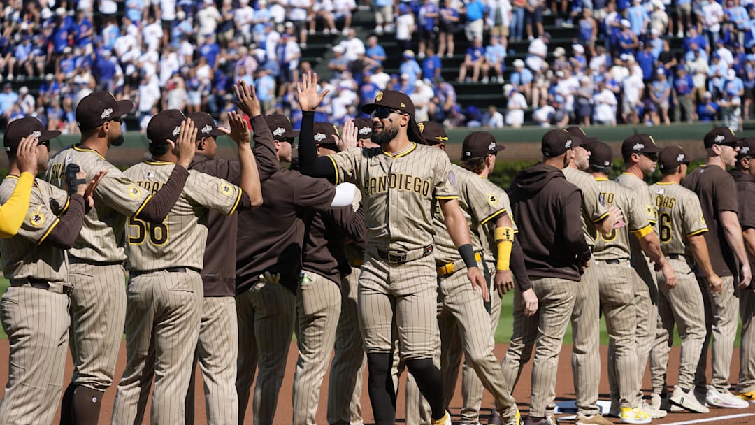 Sep 30, 2025; Chicago, Illinois, USA; San Diego Padres outfielder Fernando Tatis Jr. (23) is introduced during game one of the Wildcard round for the 2025 MLB playoffs at Wrigley Field. Mandatory Credit: David Banks-Imagn Images