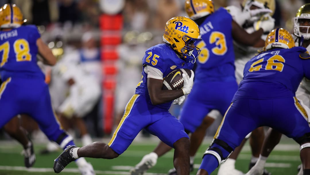 Nov 22, 2025; Atlanta, Georgia, USA; Pittsburgh Panthers running back Ja'Kyrian Turner (25) runs the ball against the Georgia Tech Yellow Jackets in the second quarter at Bobby Dodd Stadium at Hyundai Field. Mandatory Credit: Brett Davis-Imagn Images