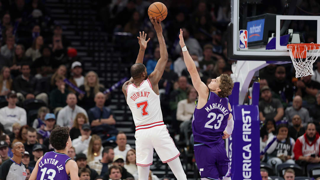 Dec 1, 2025; Salt Lake City, Utah, USA;  Houston Rockets forward Kevin Durant (7) shoots the ball over Utah Jazz forward Lauri Markkanen (23) during the second quarter at Delta Center. Mandatory Credit: Chris Nicoll-Imagn Images