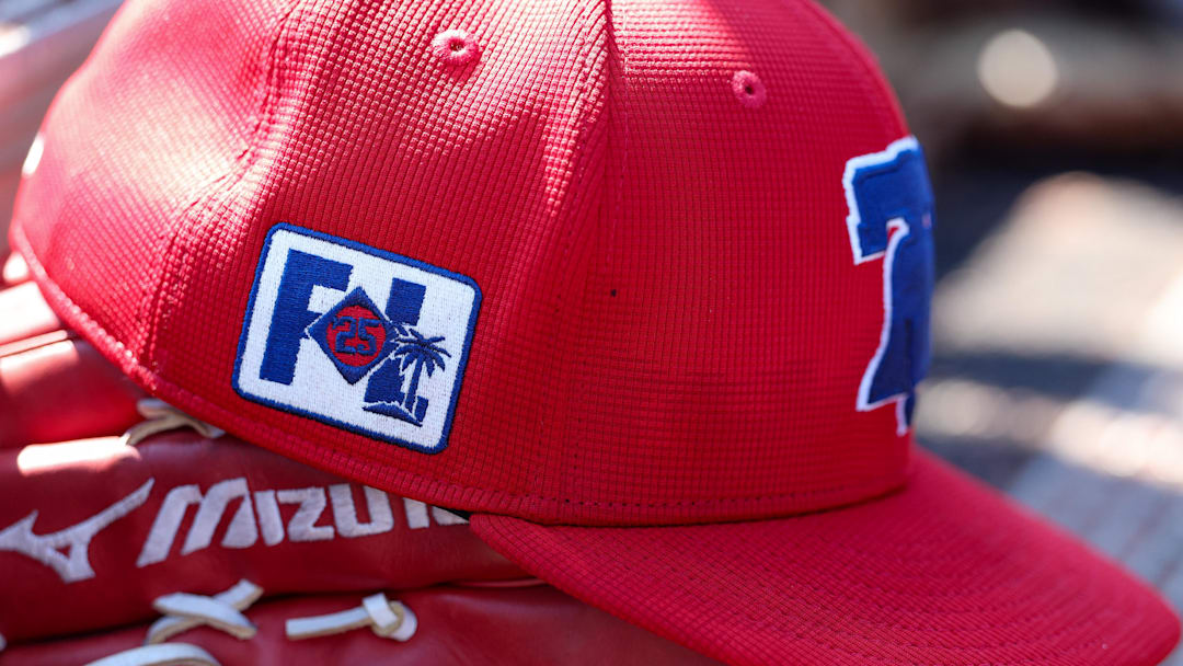Feb 26, 2025; Dunedin, Florida, USA; Philadelphia Phillies outfielder Gabriel Rincones Jr. (85) hat sits in the dugout against the Toronto Blue Jays in the fifth inning during spring training at TD Ballpark. Mandatory Credit: Nathan Ray Seebeck-Imagn Images
