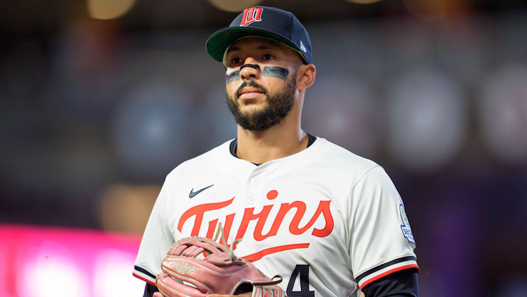 Jul 26, 2025; Minneapolis, Minnesota, USA; Minnesota Twins shortstop Carlos Correa (4) walks to the dugout after the ninth inning against the Washington Nationals at Target Field. Mandatory Credit: Matt Blewett-Imagn Images