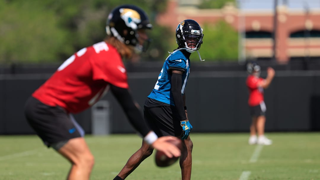 Jacksonville Jaguars wide receiver Travis Hunter (12) looks to quarterback Trevor Lawrence (16) during the 10th organized team activity at Miller Electric Center Wednesday, June 4, 2025 in Jacksonville, Fla. [Corey Perrine/Florida Times-Union]