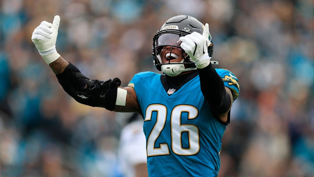 Jacksonville Jaguars safety Antonio Johnson (26) reacts to his tackle during the first quarter of an NFL football matchup at EverBank Stadium, Sunday, Jan. 4, 2026, in Jacksonville, Fla. The Jaguars defeated the Titans 41-7, capturing the AFC South title. [Corey Perrine/Florida Times-Union]