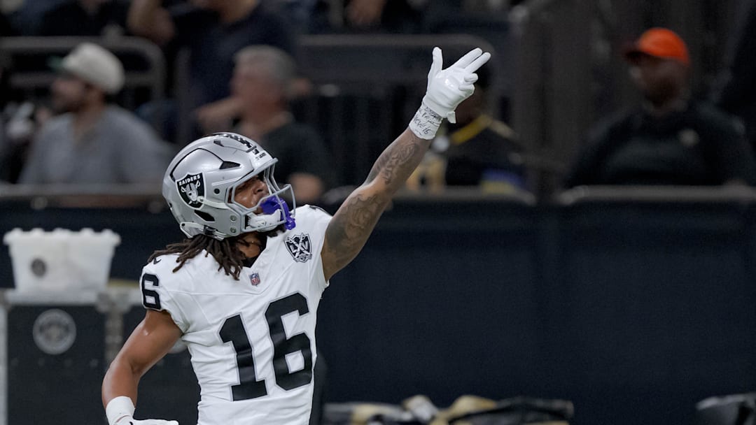 Dec 29, 2024; New Orleans, Louisiana, USA; Las Vegas Raiders wide receiver Jakobi Meyers (16) signals a first down against the New Orleans Saints at Caesars Superdome. Mandatory Credit: Matthew Hinton-Imagn Images