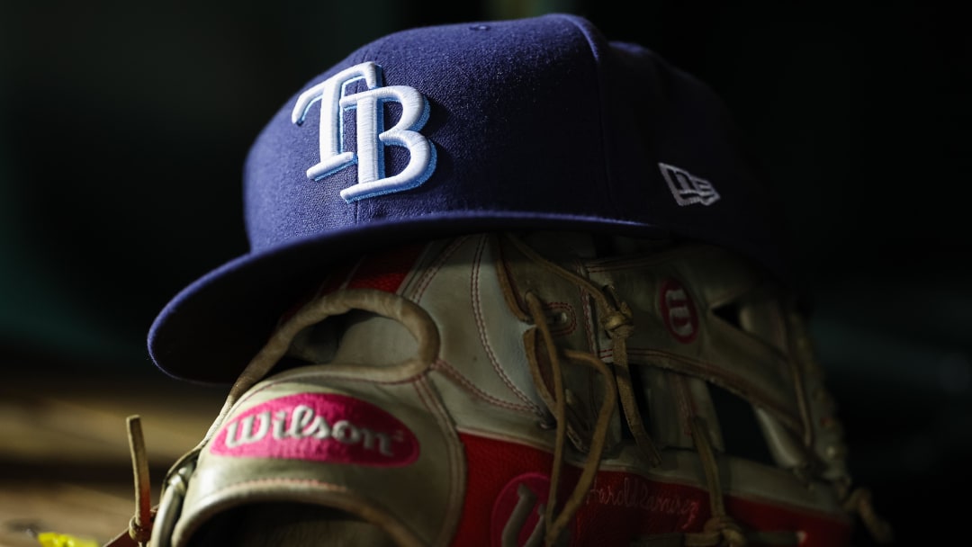 Apr 3, 2023; Washington, District of Columbia, USA; A general view of a Tampa Bay Rays hat and glove during the seventh inning of the game against the Washington Nationals at Nationals Park.