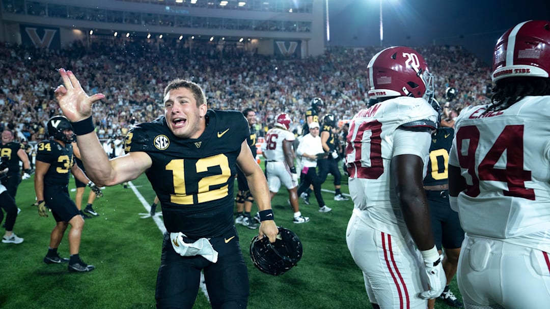 Vanderbilt Commodores quarterback Brennan Storer (12) celebrates after knocking off the Alabama Crimson Tide 40-35 at Vanderbilt Stadium in Nashville, Tenn., Saturday, Oct. 5, 2024.