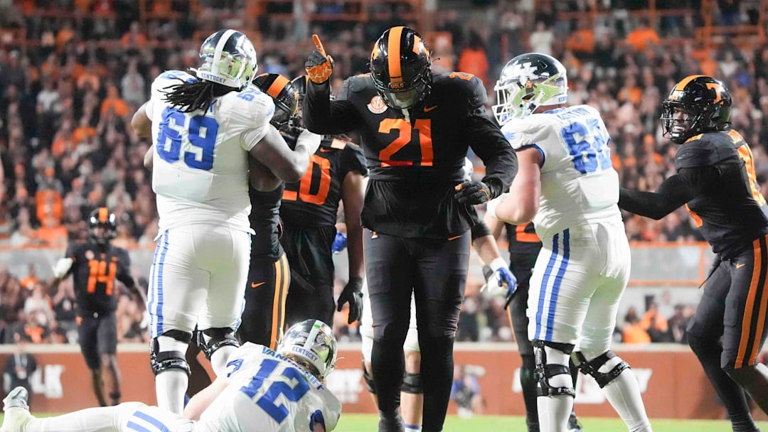 Nov 2, 2024; Knoxville, Tennessee, USA; Tennessee Volunteers defensive lineman Omari Thomas (21) celebrates a sack against the Kentucky Wildcats during the first half at Neyland Stadium. Mandatory Credit: Caitie McMekin/USA TODAY Network via Imagn Images