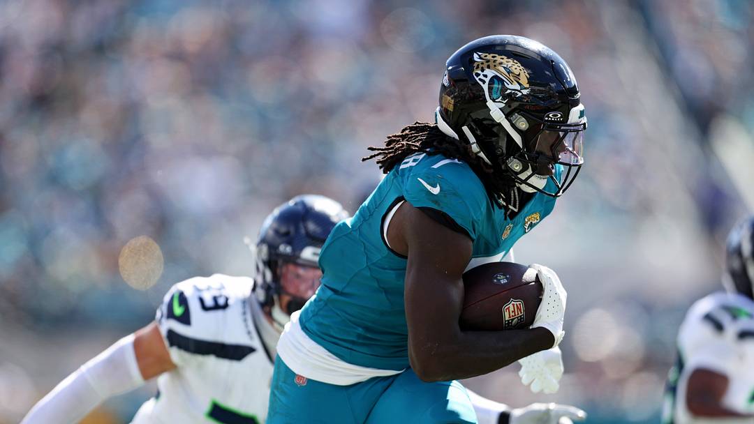 Oct 12, 2025; Jacksonville, Florida, USA; Jacksonville Jaguars wide receiver Brian Thomas Jr. (7) scores a touchdown that is called back for a flag during the second half against the Seattle Seahawks at EverBank Stadium. Mandatory Credit: Morgan Tencza-Imagn Images