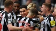 Newcastle celebrate Miguel Almiron's goal against Burnley but he could lose his place in midweek