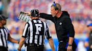 Florida Gators head coach Billy Napier argues with officials during the first quarter of an NCAA college football matchup Saturday, Nov. 2, 2024 at EverBank Stadium in Jacksonville, Fla. The Georgia Bulldogs defeated the Florida Gators 34-20. [Corey Perrine/Florida Times-Union]