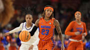 Mar 7, 2025; Greenville, SC, USA; Florida Gators guard Liv McGill (23) handles the ball during the first half against the LSU Lady Tigers at Bon Secours Wellness Arena. Mandatory Credit: Jim Dedmon-Imagn Images