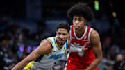 Feb 20, 2025; Indianapolis, Indiana, USA; Indiana Pacers guard Tyrese Haliburton (0) and Memphis Grizzlies forward Jaylen Wells (0) in the first half at Gainbridge Fieldhouse. Mandatory Credit: Trevor Ruszkowski-Imagn Images