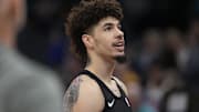 Mar 3, 2025; Charlotte, North Carolina, USA; Charlotte Hornets guard LaMelo Ball (1) during pregame warm ups against the Golden State Warriors at Spectrum Center. Mandatory Credit: Jim Dedmon-Imagn Images