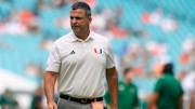 Sep 13, 2025; Miami Gardens, Florida, USA; Miami Hurricanes head coach Mario Cristobal looks on before a game against the South Florida Bulls at Hard Rock Stadium. Mandatory Credit: Nathan Ray Seebeck-Imagn Images