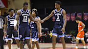 Nov 27, 2025; Kissimmee, Florida, USA; Brigham Young University Cougars center Keba Keita (13) and forward AJ Dybantsa (3) react after a called foul against the Miami (FL) Hurricanes in the second half at State Farm Field House. Mandatory Credit: Nathan Ray Seebeck-Imagn Images