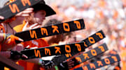 The Paddle people cheer in the first half of the college football game between the Oklahoma State Cowboys and the Baylor Bears at Boone Pickens Stadium in Stillwater, Okla., Saturday, Sept. 27, 2025.