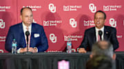 Oklahoma Athletic Director Joe Castiglione sits next to University President Joseph Harroz Jr. during a press conference announcing the retirement of Castiglione.