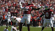 Sep 13, 2025; Tuscaloosa, Alabama, USA;  Alabama defensive lineman LT Overton (22) celebrates after sacking Wisconsin quarterback Danny O'Neil (18) at Saban Field at Bryant-Denny Stadium. Mandatory Credit: Gary Cosby-USA TODAY Network via Imagn Images