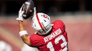 Nov 16, 2024; Stanford, California, USA; Stanford Cardinal wide receiver Elic Ayomanor (13) catches a pass in warmup before the game against the Louisville Cardinals at Stanford Stadium. Mandatory Credit: Bob Kupbens-Imagn Images