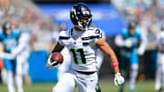 Seattle Seahawks wide receiver Jaxon Smith-Njigba (11) rushes for yards during the second quarter of an NFL football matchup, Sunday, Oct. 12, 2025, at EverBank Stadium in Jacksonville, Fla. The Seahawks defeated the Jaguars 20-12.