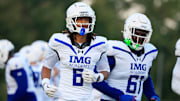 IMG Academy's Christian Ward (6) runs off the field during the first quarter of a high school football matchup at Mandarin High School, Friday, Sept. 19, 2025, in Jacksonville, Fla. The IMG Academy Ascenders defeated the Mandarin Mustangs 57-7.
