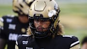Aug 29, 2025; Boulder, Colorado, USA; Colorado Buffaloes quarterback Julian Lewis (10) warms up in the second quarter against the Georgia Tech Yellow Jackets at Folsom Field. Mandatory Credit: Ron Chenoy-Imagn Images