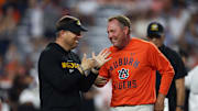 Auburn, Alabama, USA; Missouri Tigers head coach Eli Drinkwitz and Auburn Tigers head coach Hugh Freeze speak before the game at Jordan-Hare Stadium.