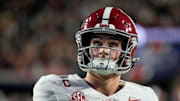 Auburn, Alabama, USA; Alabama quarterback Ty Simpson (15) warms up before the 2025 Iron Bowl game with Auburn Jordan-Hare Stadium.