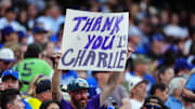 Sep 28, 2024; Denver, Colorado, USA; Colorado Rockies fan holds a sign in reference to outfielder Charlie Blackmon (not pictured) in the first inning against the Los Angeles Dodgers at Coors Field. Mandatory Credit: Ron Chenoy-Imagn Images