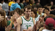 Oregon center Nate Bittle leads the Ducks through the student section after the game as the Oregon Ducks host the Indiana Hoosiers Tuesday, March 4, 2025, at Matthew Knight Arena in Eugene, Ore.