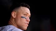 New York Yankees right fielder Aaron Judge (99) stands in the dugout against the Athletics in the seventh inning at Sutter Health Park on May 11.