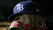 Apr 3, 2023; Washington, District of Columbia, USA; A general view of a Tampa Bay Rays hat and glove during the seventh inning of the game against the Washington Nationals at Nationals Park. Mandatory Credit: Scott Taetsch-Imagn Images