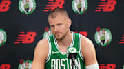 Sep 24, 2024; Boston, MA, USA; Boston Celtics center Kristaps Porzingis (8) talks to reporters during media day at Auerbach Center. Mandatory Credit: David Butler II-Imagn Images