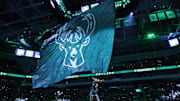 Dec 11, 2023; Milwaukee, Wisconsin, USA;  Milwaukee Bucks mascot Bango waves flag with the Milwaukee Bucks logo prior to the game against the Chicago Bulls at Fiserv Forum. Mandatory Credit: Jeff Hanisch-Imagn Images