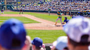 Mar 9, 2025; Phoenix, Arizona, USA; Fans watch as Oakland Athletics outfielder Carlos Cortes (31) bats in the third inning during a spring training game between the Los Angeles Dodgers at Camelback Ranch-Glendale. Mandatory Credit: Allan Henry-Imagn Images