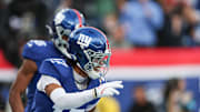 Dec 29, 2024; East Rutherford, New Jersey, USA; New York Giants wide receiver Wan'Dale Robinson (17) celebrates his touchdown reception during the first half against the Indianapolis Colts at MetLife Stadium.   