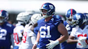 New York Giants center John Michael Schmitz Jr. suffered a shin injury last week.