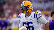 LSU Tigers offensive tackle Will Campbell (66) warms up before a game against the South Carolina Gamecocks.