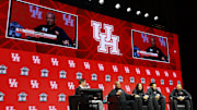 Oct 22, 2025; Kansas City, MO, USA; Houston head coach Kelvin Sampson and players speak to media during Big 12 Menís Basketball media day at T-Mobile Center. Mandatory Credit: Sophia Scheller-Imagn Images