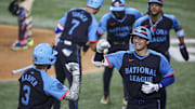 The National League celebrates after National League designated hitter Shohei Ohtani of the Los Angeles Dodgers (17) hit a three run home run during the third inning during the 2024 MLB All-Star game at Globe Life Field on July 16, 2024.