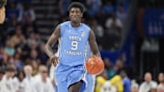Mar 14, 2025; Charlotte, NC, USA; North Carolina Tar Heels guard Drake Powell (9) during the first half against the Duke Blue Devils at Spectrum Center. Mandatory Credit: Jim Dedmon-Imagn Images
