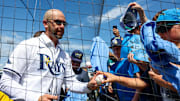 Former Tampa Bay third baseman Evan Longoria signs autographs for fans Saturday in Tampa, on the day he retired as a Ray.