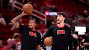 Apr 4, 2025; Houston, Texas, USA; Houston Rockets guard Jalen Green (4) and center Alperen Sengun (28) warm up prior to the game against the Oklahoma City Thunder at Toyota Center. Mandatory Credit: Erik Williams-Imagn Images
