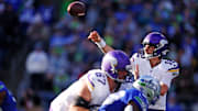 Nov 30, 2025; Seattle, Washington, USA; Minnesota Vikings quarterback Max Brosmer (12) throws a pass during the second half against the Seattle Seahawks at Lumen Field. Mandatory Credit: Kevin Ng-Imagn Images