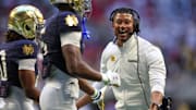 Oct 19, 2024; Atlanta, Georgia, USA; Notre Dame Fighting Irish head coach Marcus Freeman celebrates after a touchdown against the Georgia Tech Yellow Jackets in the third quarter at Mercedes-Benz Stadium. 