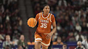 March 9, 2025; Greenville, SC, USA; Texas Longhorns forward Madison Booker (35) brings the ball up court against South Carolina Gamecocks during the first half at Bon Secours Wellness Arena. Mandatory Credit: Jim Dedmon-Imagn Images