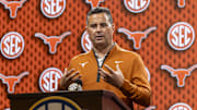 Oct 14, 2025; Birmingham, AL, USA; Texas Longhorns head coach Sean Miller talks with the media during SEC Media Days at Grand Bohemian Hotel. Mandatory Credit: Vasha Hunt-Imagn Images